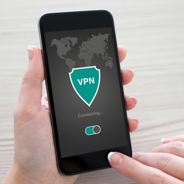 turbovpn android devices vpn service hand holding smartphone connecting to vpn 